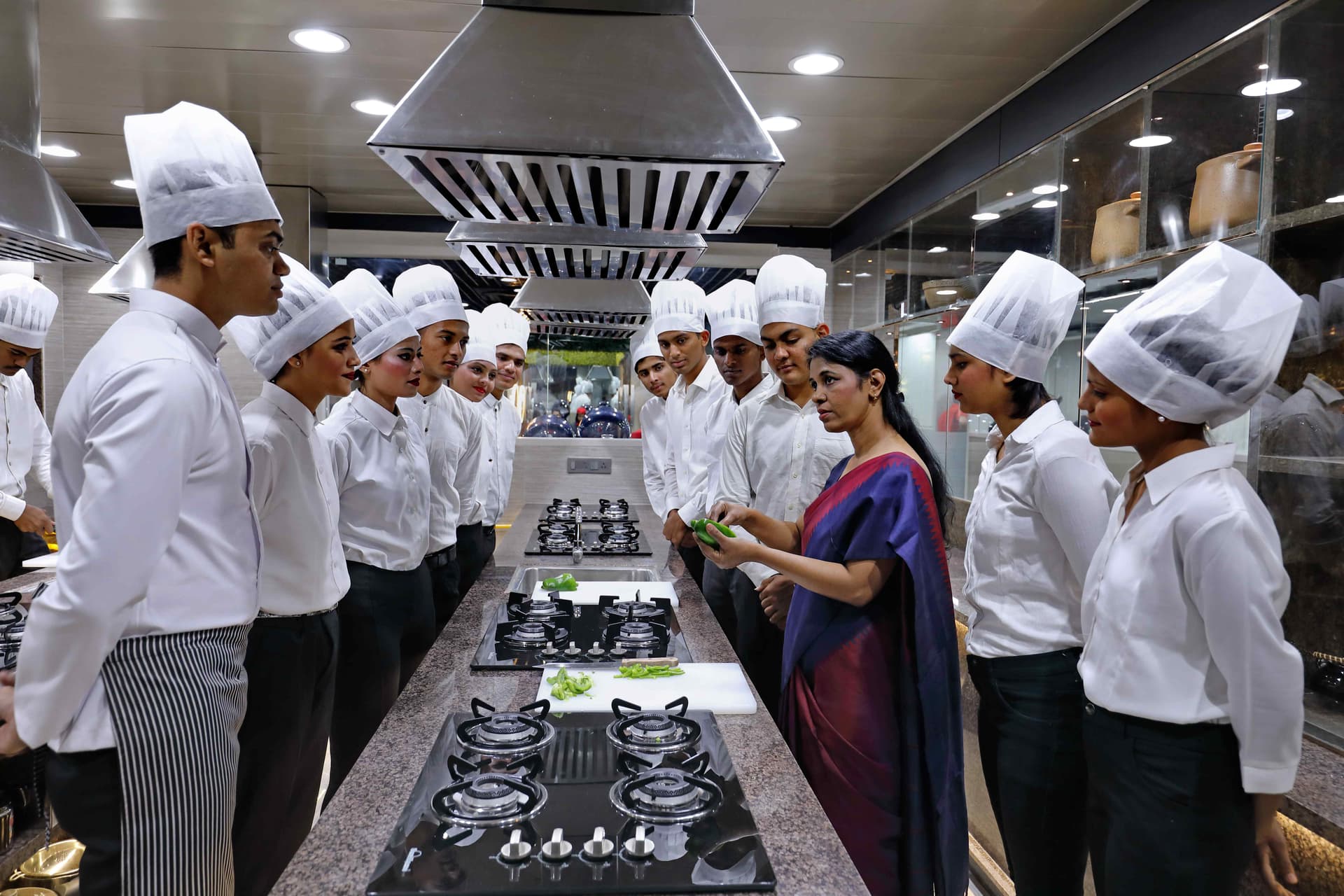 Wings Institute commercial kitchen lab with industrial cooking equipment for culinary training Vadodara