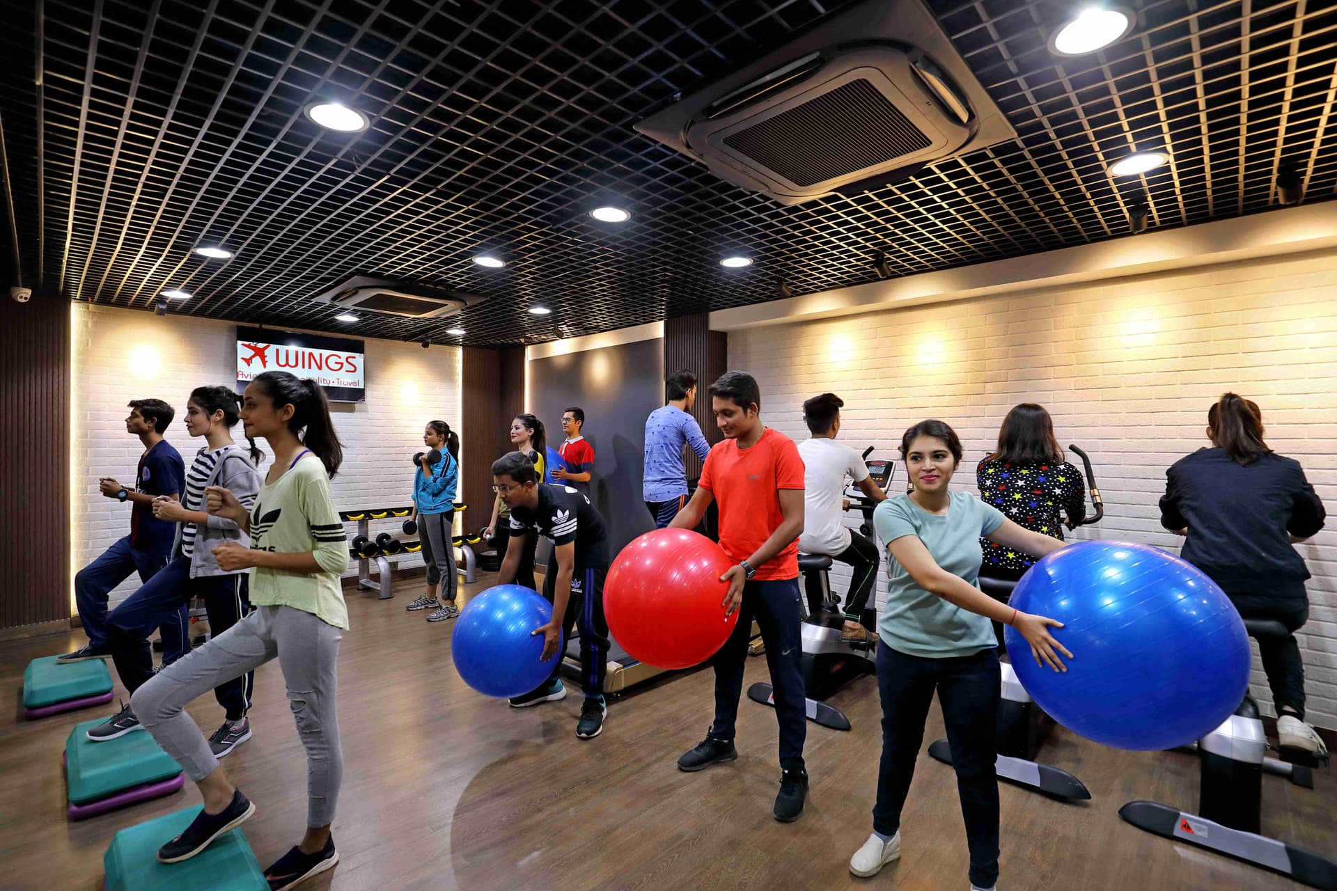 Wings Institute in-house fitness center for aviation BMI standards training Alkapuri campus Vadodara